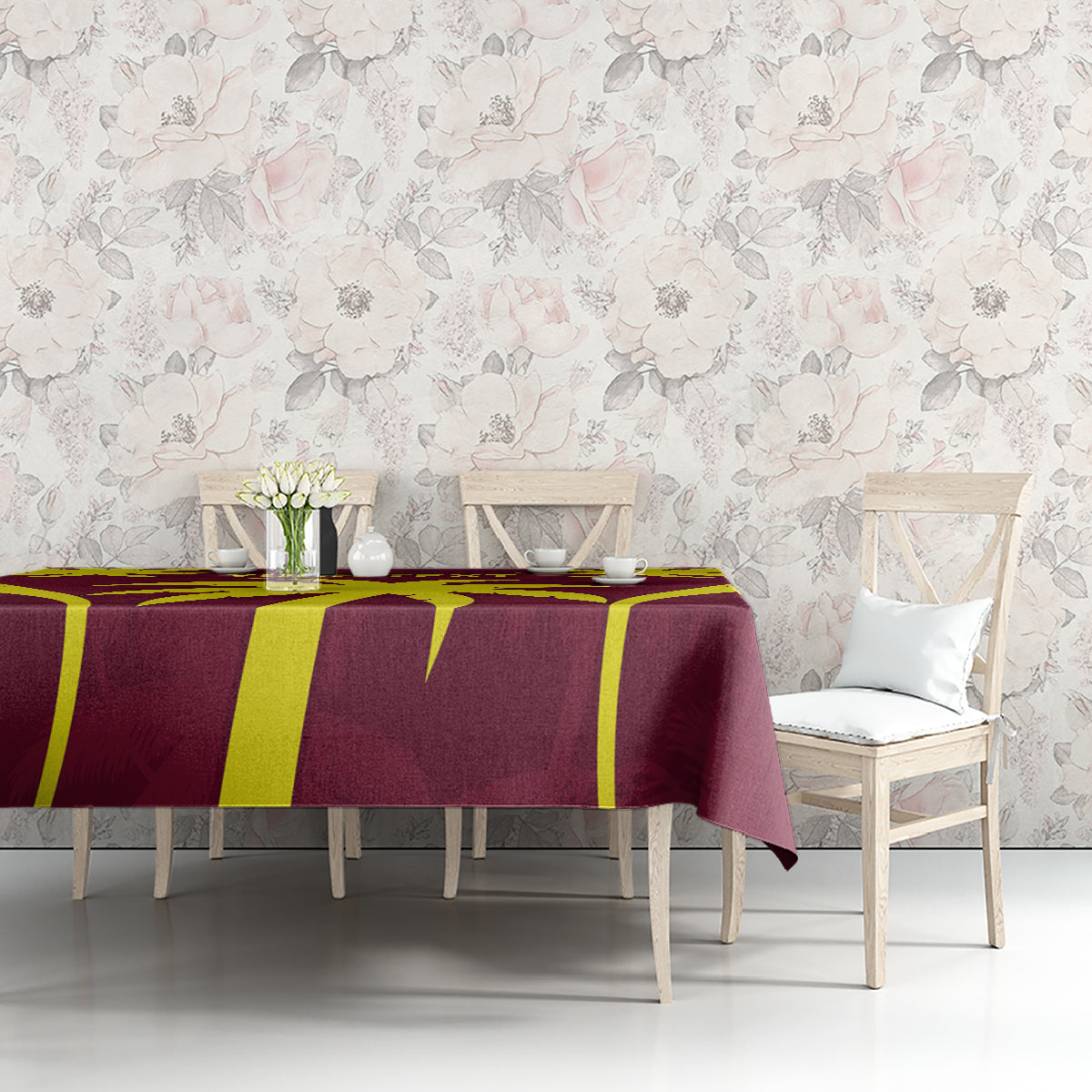 Maroon and yellow tablecloth with bold vertical graphic stripes and sunburst accents