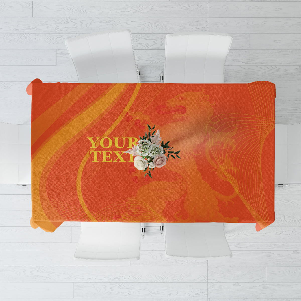 Orange patterned tablecloth with curved stripe and floral print, draped over a table