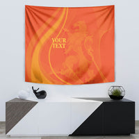 Orange rectangular tapestry wall hanging with gold swirl graphic and placeholder text
