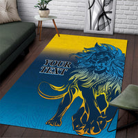 Blue area rug with detailed lion graphic, yellow accents, and “YOUR TEXT” lettering