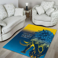 Blue area rug with lion graphic in blue and yellow, with “YOUR TEXT” lettering
