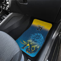 Blue car floor mat with lion graphic and 21 logo in rear passenger area