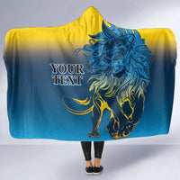 Hooded blanket with lion graphic and blue-and-yellow design, hooded poncho style