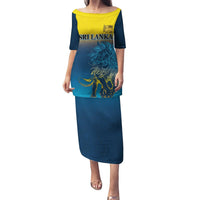 Blue long puletasi dress with yellow neckline and lion graphic, Sri Lanka text