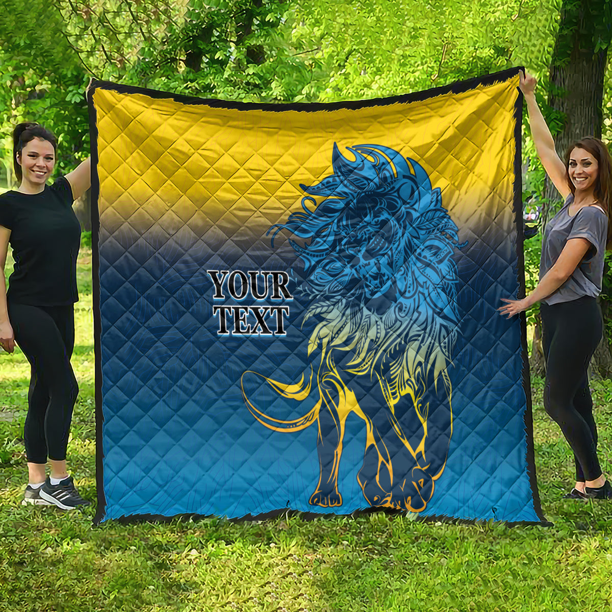 Quilt blanket with blue-and-yellow diamond quilting and a blue lion graphic, “YOUR TEXT”