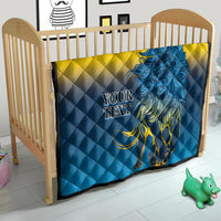 Baby quilt blanket with blue-and-yellow diamond quilting and blue lion graphic, “YOUR TEXT”