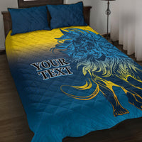 Blue and yellow quilt bed set with lion graphic and two matching pillowcases