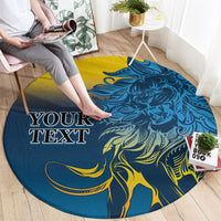 Round blue lion graphic rug with yellow accents; placeholder text area on top