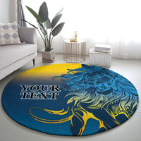 Round blue carpet rug featuring lion illustration in yellow and blue with text space