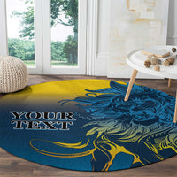 Round blue lion graphic carpet rug with yellow accents and customizable text placeholder