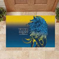 Blue rubber doormat with lion head graphic and 'YOUR TEXT' text
