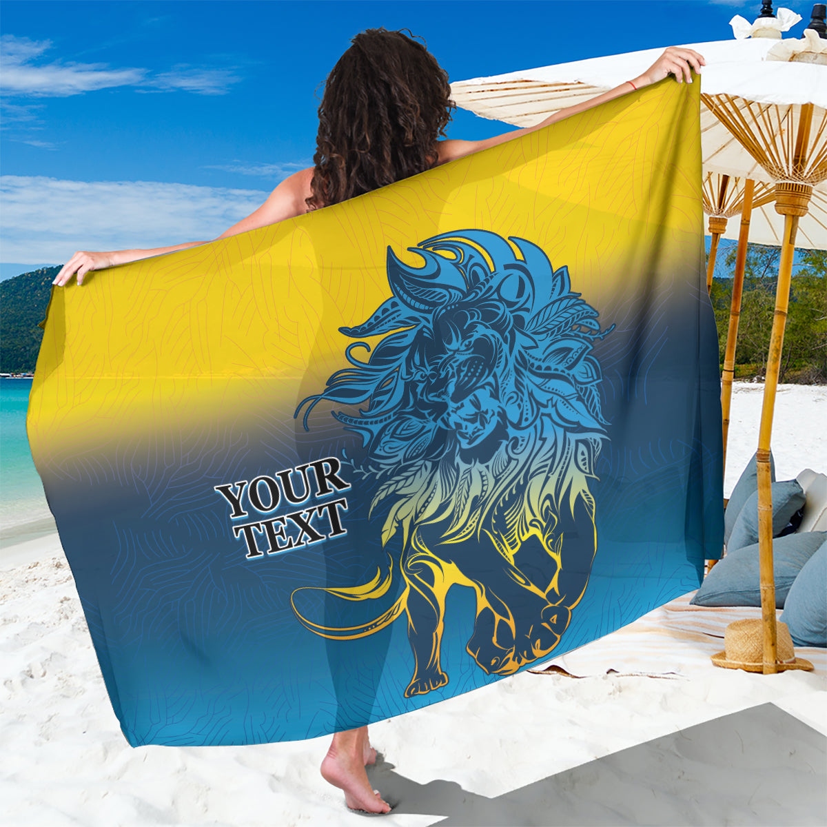 Blue and yellow lion graphic sarong with custom text panel, draped and held open