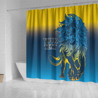 Shower curtain with lion artwork, blue and yellow ombre, and hanging grommets