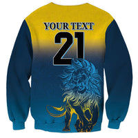 Unisex sweatshirt with yellow lion graphic, YOUR TEXT 21; blue sleeves