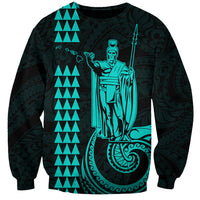 Unisex sweatshirt in dark teal/black with turquoise King Kamehameha graphic and patterns