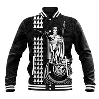 Black baseball jacket with white trim, front button placket, bold tribal graphic
