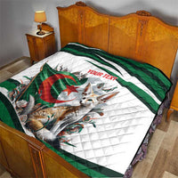 Algeria-themed personalized quilt on a bed, white diamond pattern with green stripe