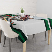 Personalized white tablecloth with green stripe border and fennec fox artwork on table