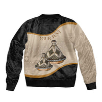 Black and beige bomber jacket with back print showing Your Text over Tajine graphic