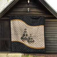 Black and beige personalized quilt panel with quilted diamonds and conical tribal figures