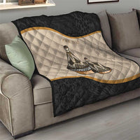 Black and beige couch throw quilt with tribal conical dish motif and gold diagonal stripe