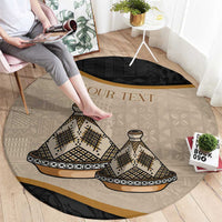 Round beige tribal carpet with black border, tajine dish print and gold 'YOUR TEXT'