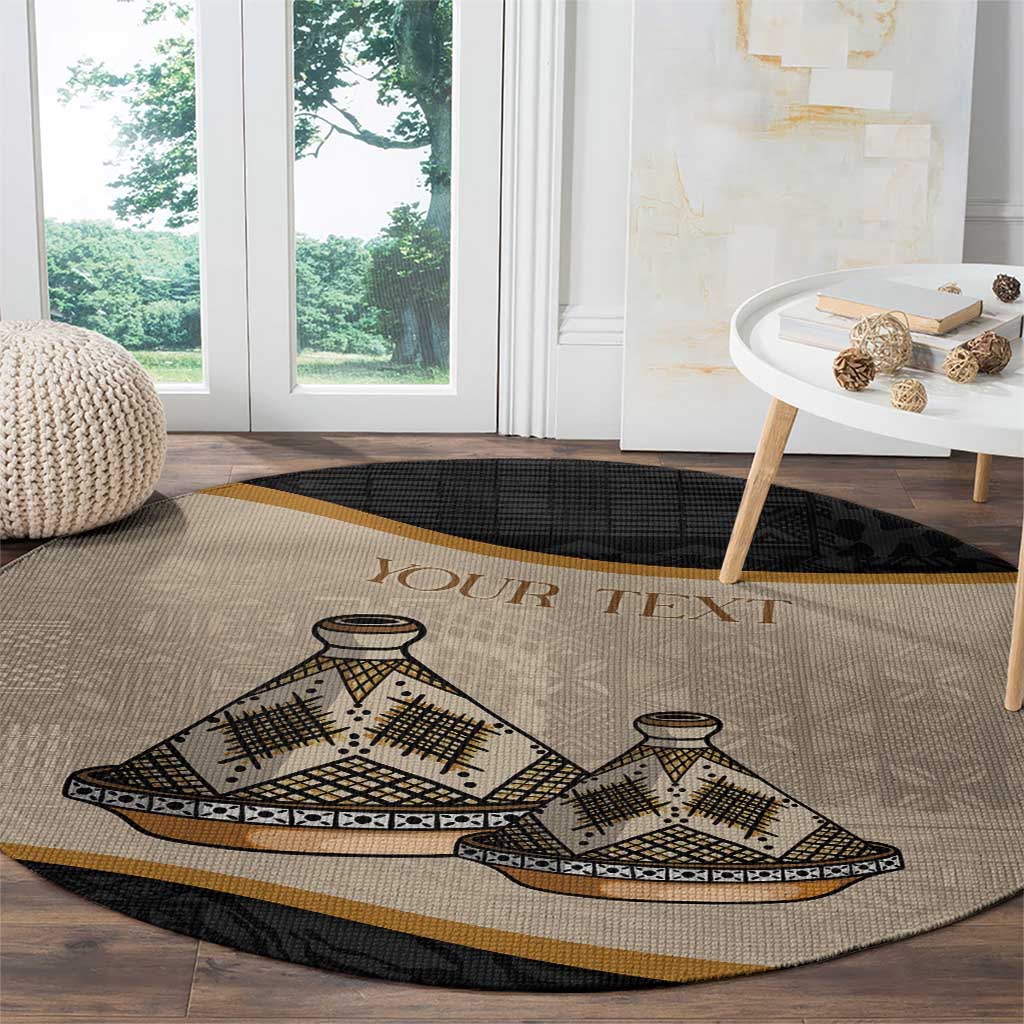 Round black-and-beige tribal tajine patterned carpet with gold 'YOUR TEXT'