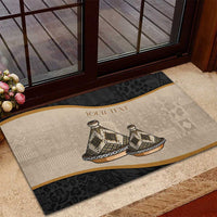 Personalized rubber doormat with tajine dish artwork and beige center, black patterned border