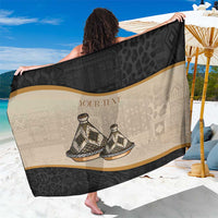 Personalized sarong black and beige African pattern with central motif and gold trim