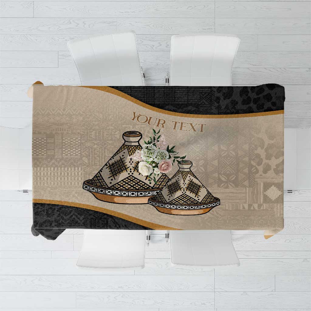 Personalized beige and black tablecloth with tajine illustration, flowers, and “YOUR TEXT”