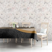 Black and beige Moroccan-style tablecloth with geometric tribal pattern and gold stripe