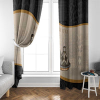 Black and beige window curtain panels with tajine motif and gold band at mid-height