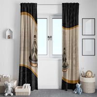 Two black and beige window curtain panels with tajine design and gold trim