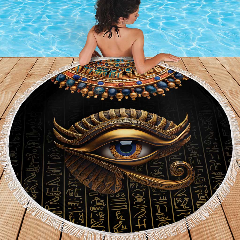 Round black beach blanket with gold Eye of Horus and Egyptian hieroglyphs, white fringe edge