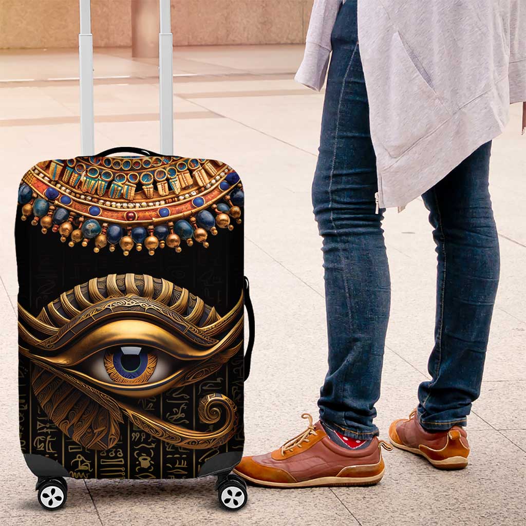 Black suitcase luggage cover showing Eye of Horus design with gold lines and blue accents