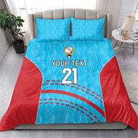 Blue and red cricket bedding set with 'YOUR TEXT 21' design on duvet and matching pillows