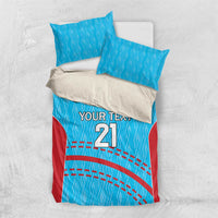 Cricket bedding set with blue duvet, red lower panel, 'YOUR TEXT 21' design and two pillows