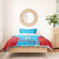 Blue and red cricket bedding set with 'YOUR TEXT 21' design on duvet and coordinating pillows
