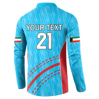 Blue back view cricket sweatshirt with YOUR TEXT 21 and red curved graphic, flag cuffs