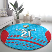 Round blue cricket carpet with red corner panels, cricket emblem, and 'Your text 21' center