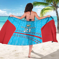 Blue and red cricket-pattern sarong, back view with 'YOUR TEXT 21' and zigzag lines