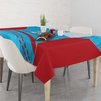 Cricket tablecloth with blue patterned center and solid red table skirt with folded drape