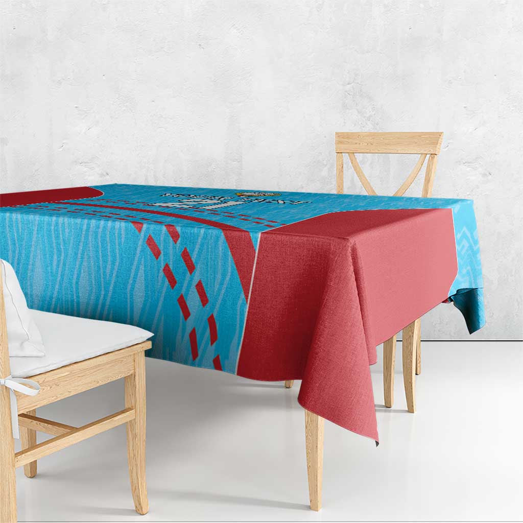 Blue cricket tablecloth with red side panels and smooth draped corner on dining bench