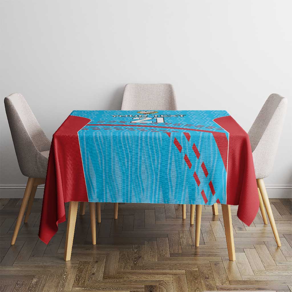 Blue and red cricket tablecloth on square dining table with chair set in front view
