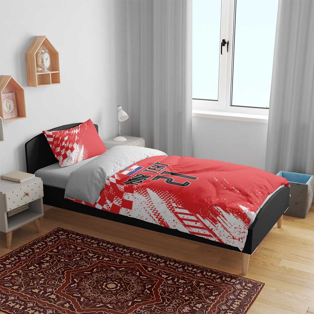 Red and white custom bedding set with sporty graphic pattern, custom text, and number 21