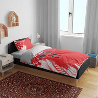 Red and white custom bedding set with sporty graphic pattern, custom text, and number 21