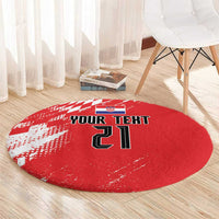 Red round rug with sporty checkered design and bold YOUR TEXT numbers
