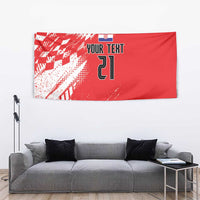 Red rugby tapestry wall hanging with sporty pattern, shield icon, and number