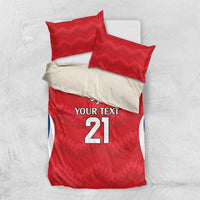 Red duvet cover set with two pillows, number 21 rugby design and blue-and-white curved stripes