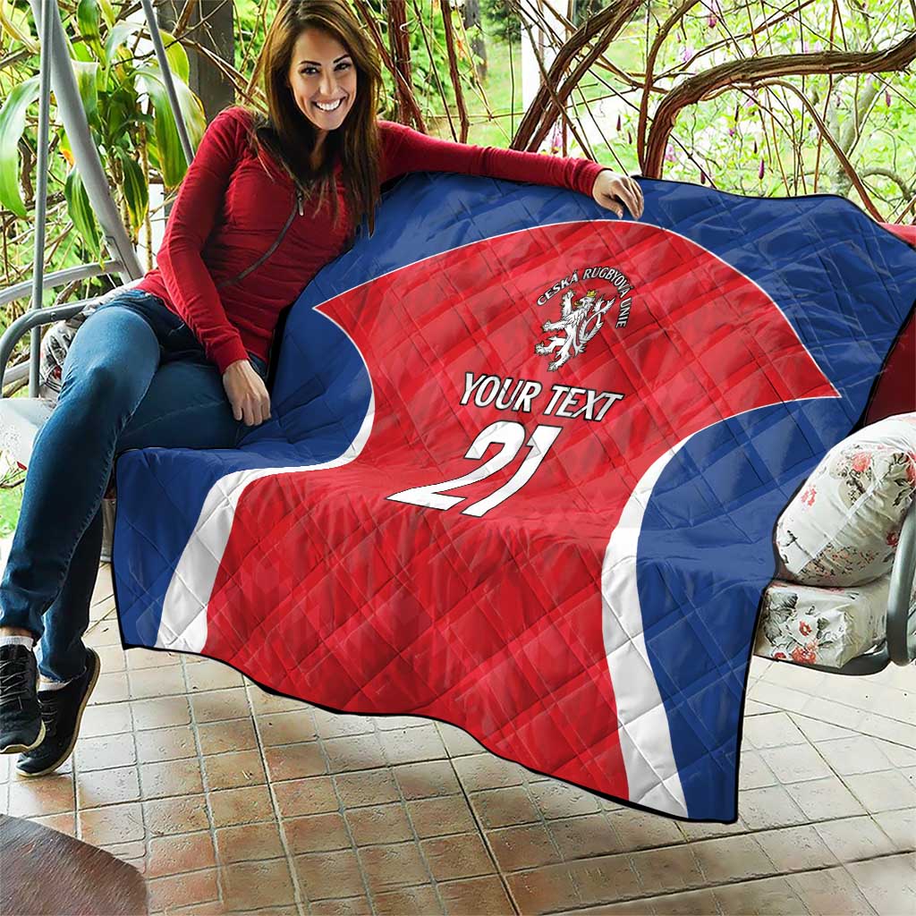 Custom rugby quilt draped outdoors: blue border, red jersey, lion crest, “YOUR TEXT” 21